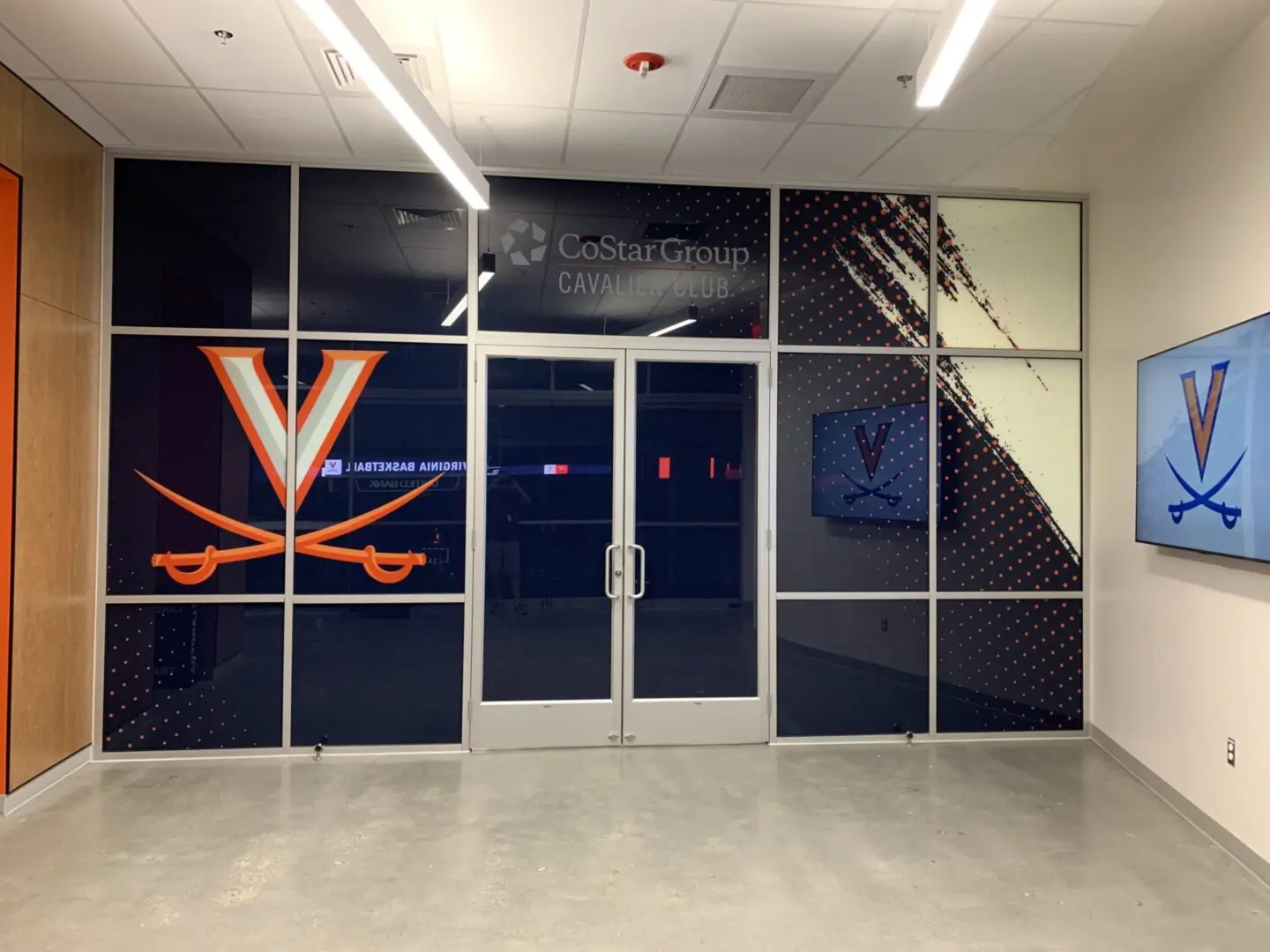 A large window with the virginia cavaliers logo on it.